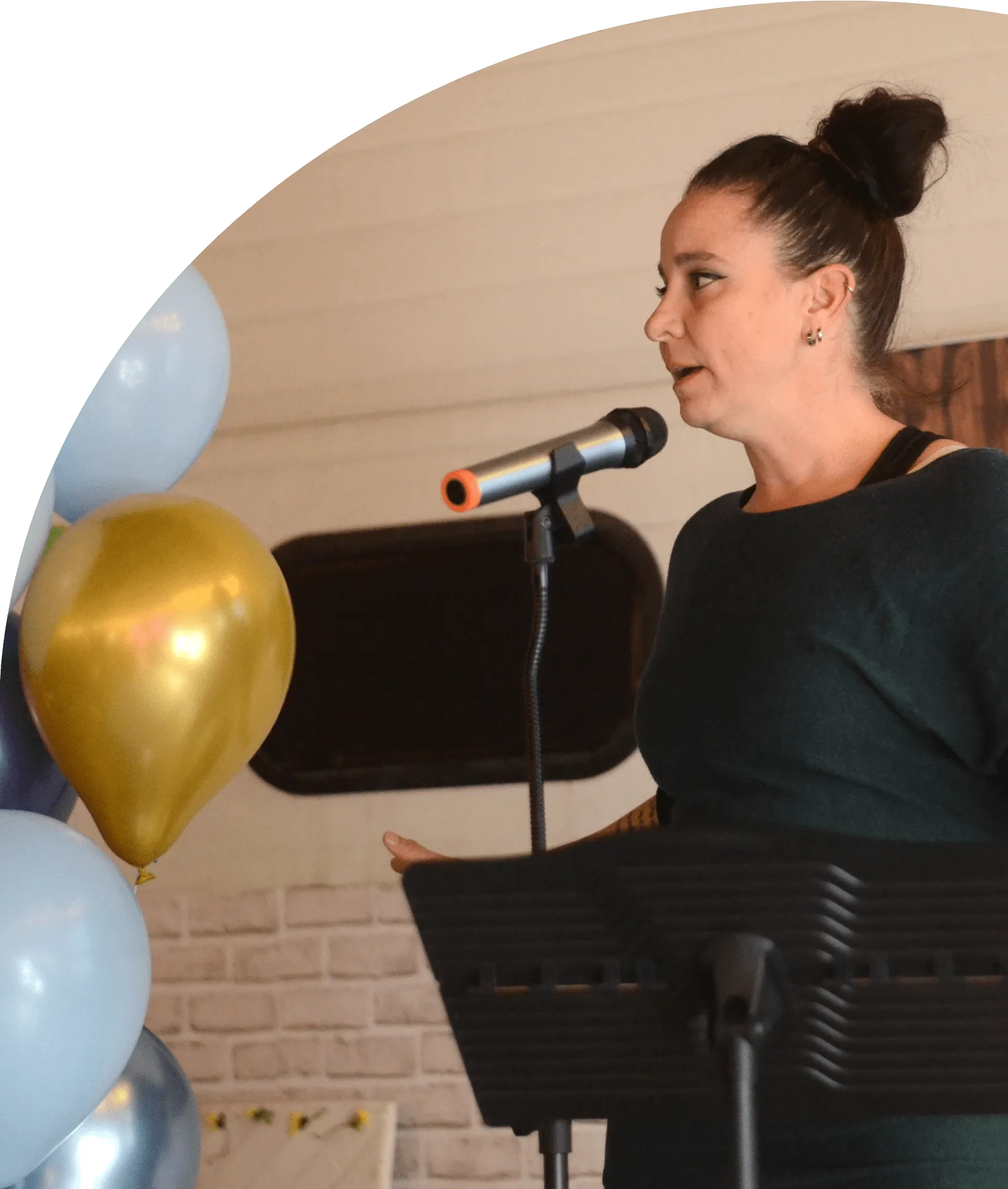 a women speaking at a Dave's Gift Society event
