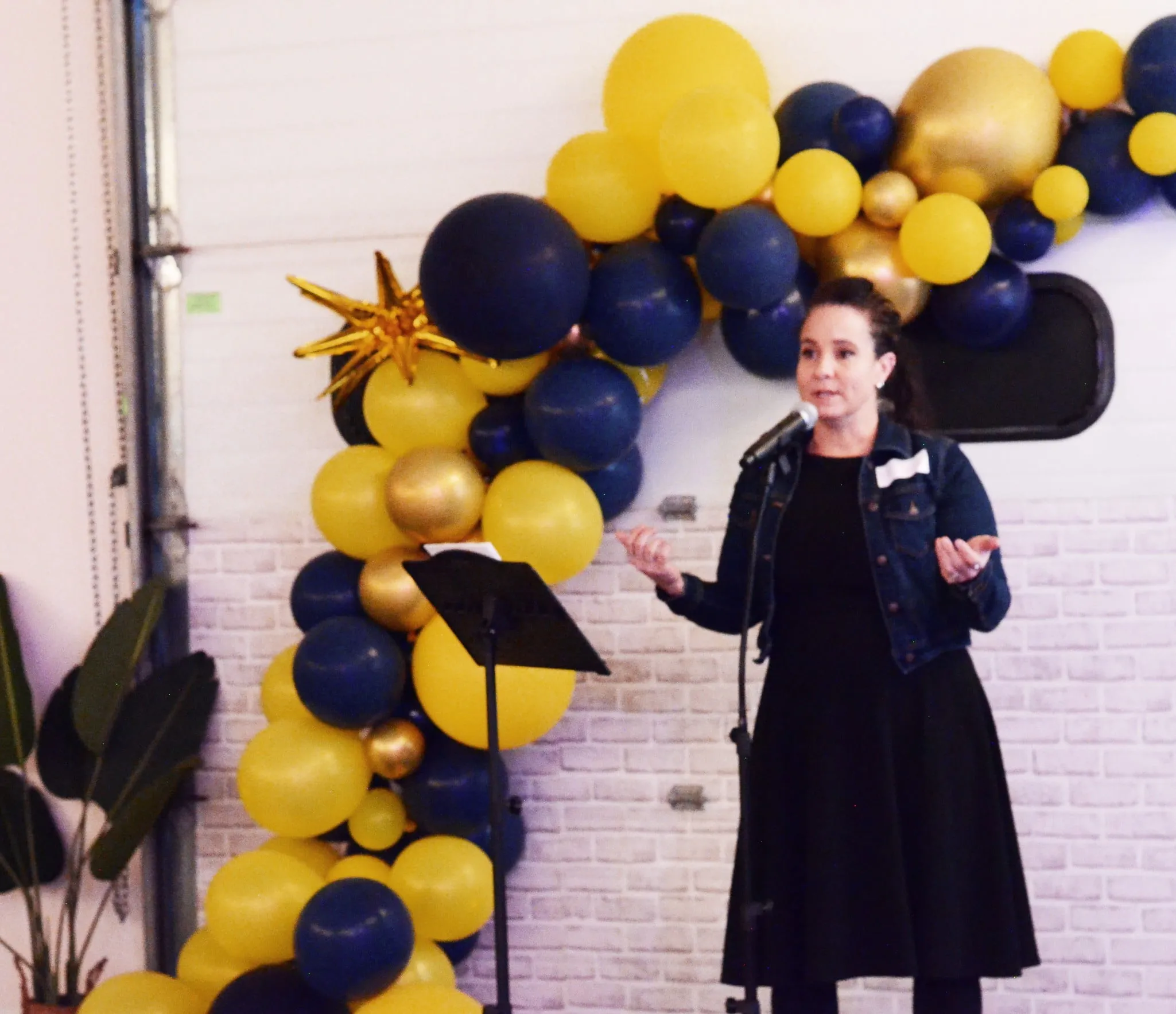 a women speaking at a Dave's Gift Society event